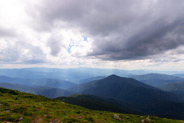 Fototapeta premium Beautiful low clouds over the mountains. Mountain landscape.