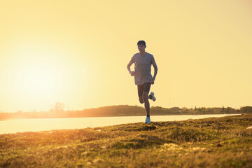 A man running. A jogger in the sun.