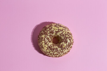 Donut planet on a pink background. Minimal concept. 