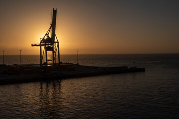 Obraz premium Silhouette Kran