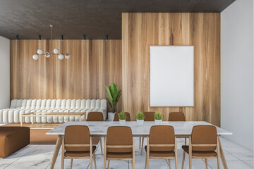 White and wooden dining room with sofa and poster