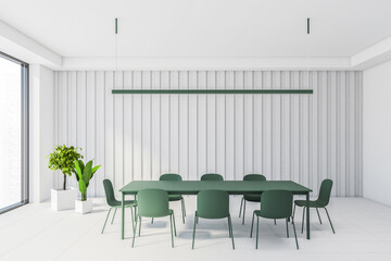 White dining room interior with green table