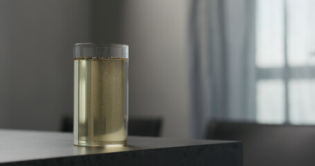 soda drink in highball glass on concrete countertop with copy space