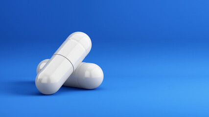 Pair of white pills on blue background. 3d rendering