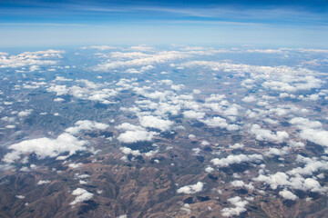 areal view of clouds and desert