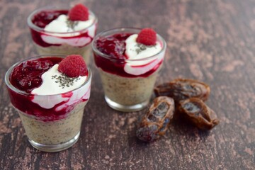 Chia date pudding with yogurt and raspberry sauce