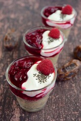 Chia date pudding with yogurt and raspberry sauce