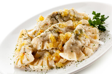 Dumplings - noodles with meat on white background