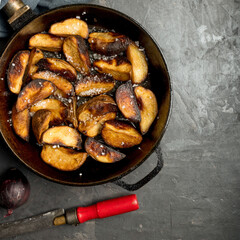 sweet potatoes, baked chicken, potato wedges, iron pan, dark background, pepper onions, french fries, baked potatoes
