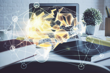 Double exposure of work space with computer and human brain drawing hologram. Brainstorm concept.