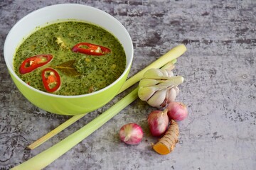 Daun ubi tumbuk or daun singkong or pounded and seasoned cassava leaves. Traditional Indonesian cuisine
