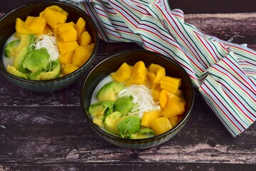 Es Teler, Indonesian cuisine, dessert from jackfruit, avocado, coconut meat, coconut milk on crushed ice