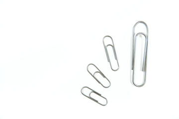 Obraz premium metal paperclips isolated on white background, copy space