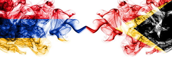 Armenia vs East Timor, Timorese smoky mystic flags placed side by side. Thick colored silky abstract smoke flags