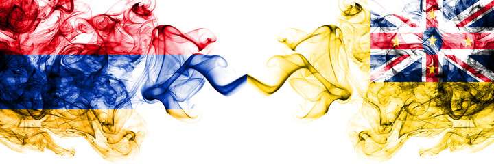 Armenia vs New Zealand, Niue smoky mystic flags placed side by side. Thick colored silky abstract smoke flags