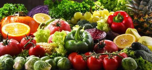Naklejka na ściany i meble Composition with variety of fresh organic vegetables and fruits