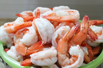 fresh shrimps served on plate  boiled peeled shrimp prawns cooked in the seafood restaurant for sell.jpg