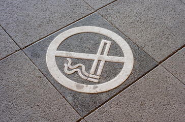 no smoking icon on the ground