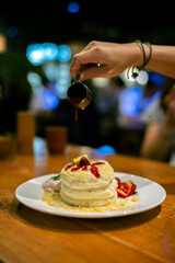 pan cake dessert with strawberry cream