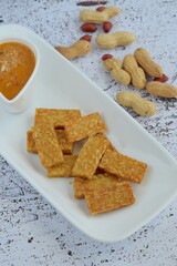 Crispy fried tempeh with homemade peanut sauce