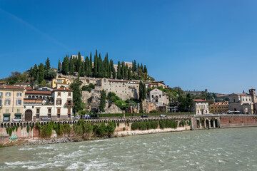 Fototapeta na wymiar Romeo, Juliet italian city panoramic view. Beautiful architecture, Adige river and bridges in Verona, Italy. Romantic travel concept.