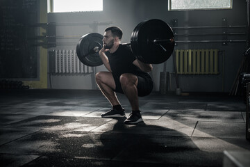 Concentrated Male Do Squat Exercise With Barbell . - 386146138