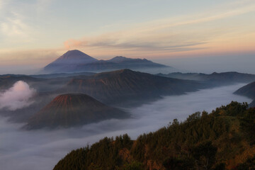 Sunrise over the smoking Gunung Bromo volcano, Bromo-Tengger-Semeru National Park, Java, Indonesia, Asia