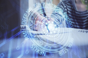 Obraz premium Double exposure of hands making notes with digital coding icons. Computer learning concept.