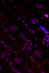 pink, purple, blue holographic stars abstract patterned background