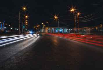 Fototapeta na wymiar Night traffic lights of the big city
