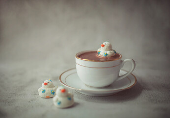marshmallow like a duck in the cup with hot cocoa and near cup