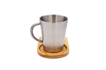 Empty Stainless steel or metal coffee cup with wooden coaster isolated on white background 