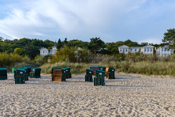 wicker beach chairs on a beach at the baltic sea in usedom, germany