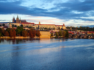View on Prague Castle and Charles Bridge in the morning light on an autumn morning