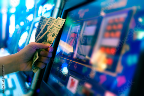 Slot Machine Play Time Female Gambler Hand Hold Money Bill Ready To Win The Game With One Best Shot Casino Close Up Wall Mural Whyframeshot