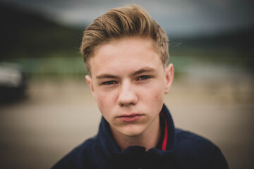portrait of a teenager , on outdoors background.