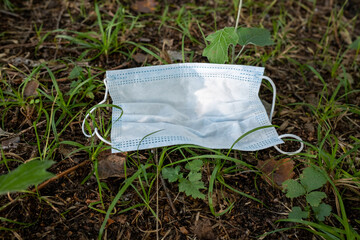 corona face mask on the ground
