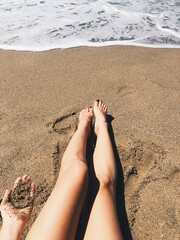 feet on the beach