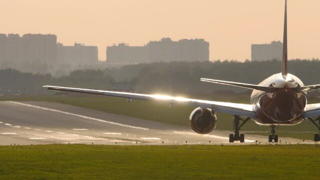 Rossiya Airlines Boeing 777 airliner lining up on the runway for departure