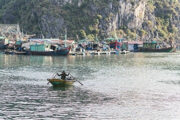 Fototapeta premium Floating Village on Ha Long Bay, Cat Ba Island, Vietnam, descending dragon bay in Asia