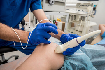 Cardiologist use tubes and ultrasound for radiofrequency catheter ablation.