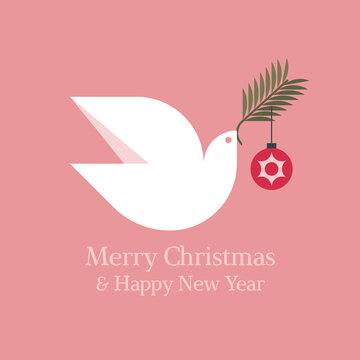 Elegant Christmas card with seasons greetings and white dove holding fir tree branch with christmas ball