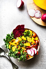 Mango with Kale,Radish and Pomegranate salad bowl