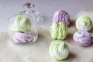 Fototapeta premium Homemade marshmallows in green and purple