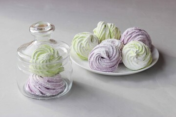 Homemade marshmallows in green and purple