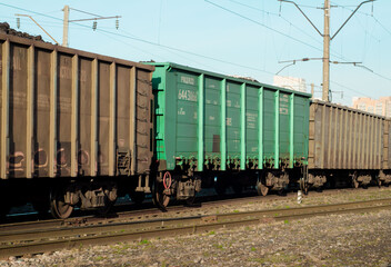Fototapeta na wymiar freight Cars in a moving freight train. Transportation by rail. Russia Krasnoyarsk, October 17, 2020
