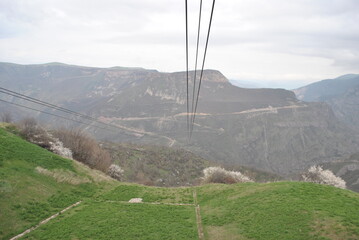 
yerevan city armenia excursion travel totev temple stonehenge journey walk tour city suburb village road path people mountains slopes rocks road walls path nature temples ancient buildings