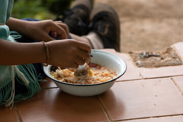 Feeding the poor to hands of a beggar. Poverty concept