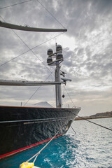 Bow of luxury Sailboat. Isolated. Bow of the largest sailboat using DynaRig technology. Sky in the...