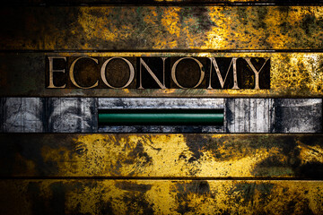 Economy text message with green confirmation sign on vintage textured grunge copper and gold background